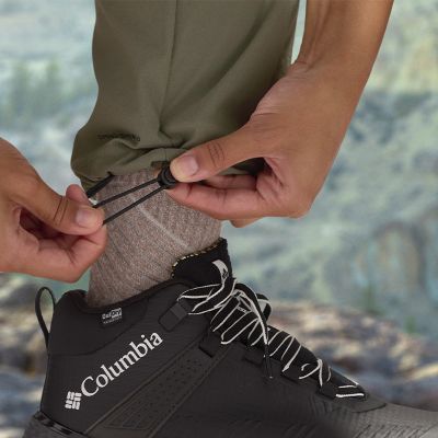 Close-up of a woman adjusting the drawcord cuffs
