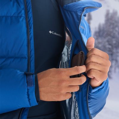Close-up of a model slipping their wallet into the inside pocket.