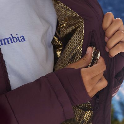 Close-up of a woman stowing keys into the security pocket