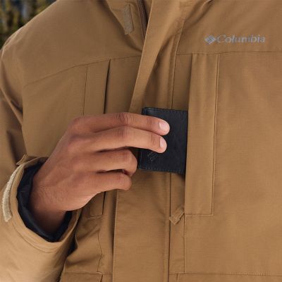Close-up of a phone going into a pocket.
