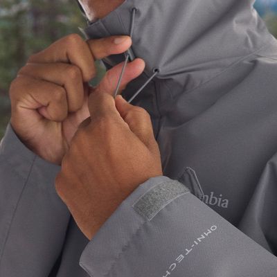 Close-up of a model adjustable drawstring on hood.