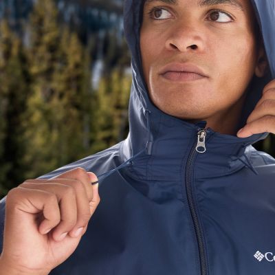 Model adjusting the hood.