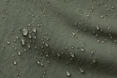 Close up of water drops on fabric.