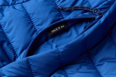 An image of the pocket that the jacket packs into