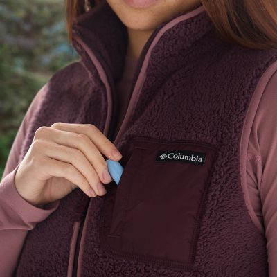 Model placing chapstick into the chest pocket.