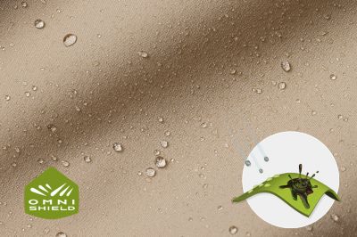 Close up of fabric with the Omni Shield logo in the bottom left and a graphic showing how moisture beads on the fabric's surface.