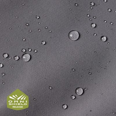 Close up of fabric with the Omni Shield logo in the bottom left and a graphic showing how moisture beads on the fabric's surface.