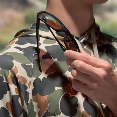 Close-up of a pair of sunglasses on a carrying loop.