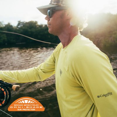 Model fishing in a sunny scene and the Omni shade tech badge in bottom left.