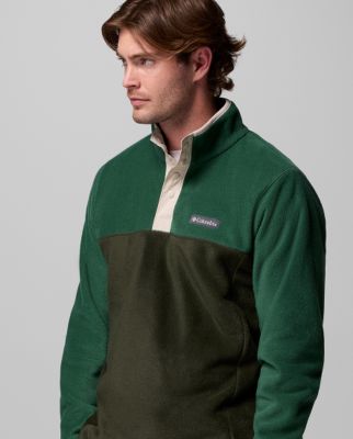 A man wearing a tan fleece jacket.