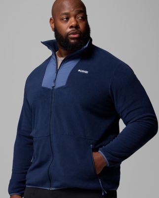 A man wearing a teal fleece jacket.