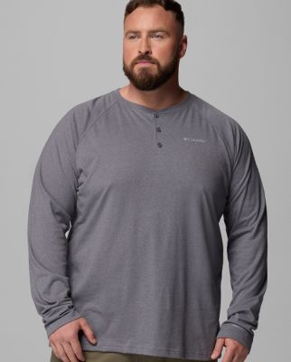 A man wearing an orange polo.