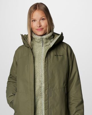 A woman wearing a dark green Interchange jacket.