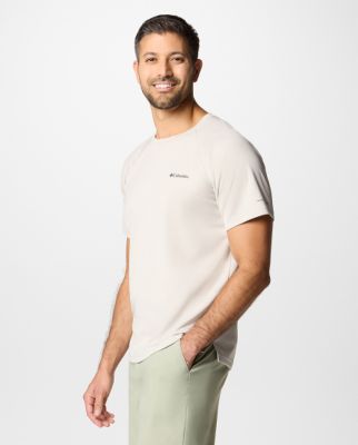 Man wearing a navy short-sleeve shirt.