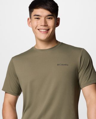 A man wearing a yellow t-shirt.