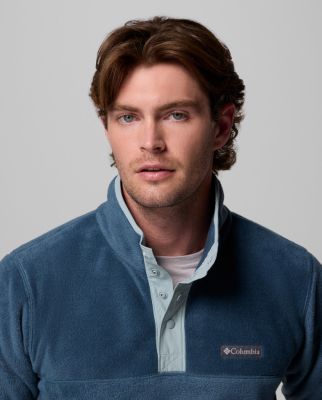 A man wearing a tan fleece jacket.