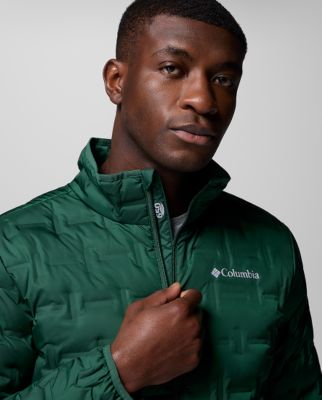 A man wearing a blue rain jacket.