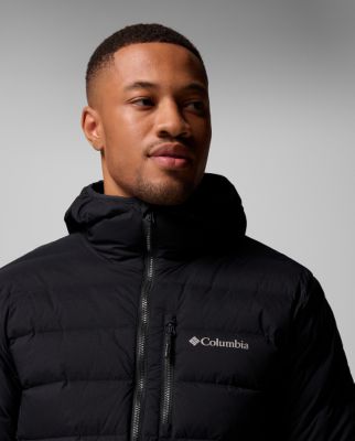Man wearing a green insulated jacket.