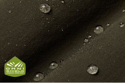 Macro of fabric showing water droplets beading.
