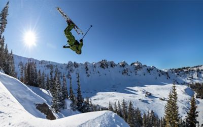 Columbia Sportswear Ski Ambassador and Olympic athlete, Alex Ferreira, soars off a jump while eying a landing for a backflip.