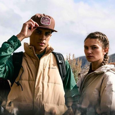 Two people wearing new fall clothes.