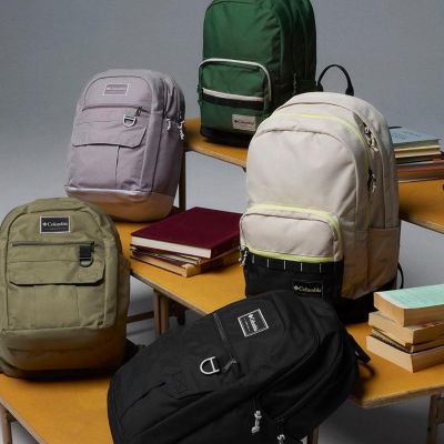 Backpacks on the bleachers.