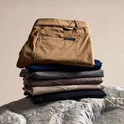 Stack of ROC Pants on a rock.