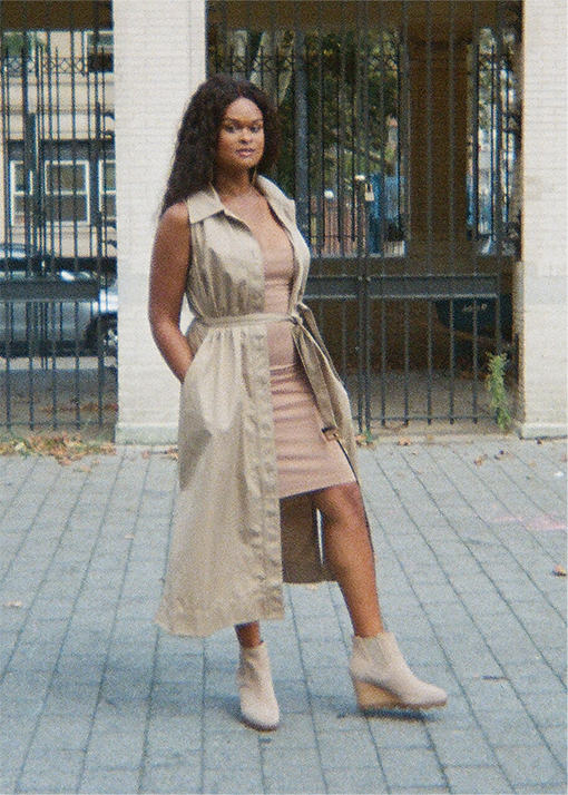 Raquel Willis wearing Joan Uptown Chelsea wedges in an urban setting