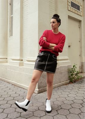 Barbie Bertischwearing Lennox Chelsea booties in an urban setting