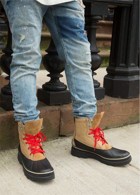 Darian Hall wearing Caribou Storm boots in an urban setting