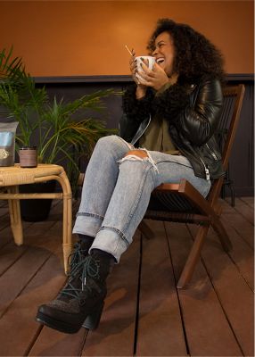 Elisa Shankle wearing Blake Lace booties in an urban setting
