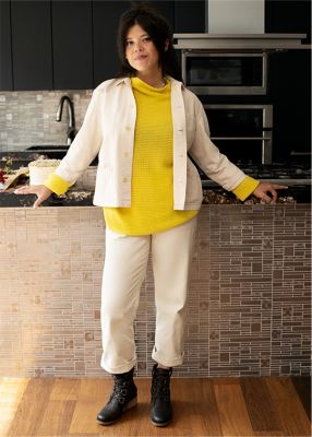 Natasha Pickowicz wearing Cate Lace booties in a kitchen