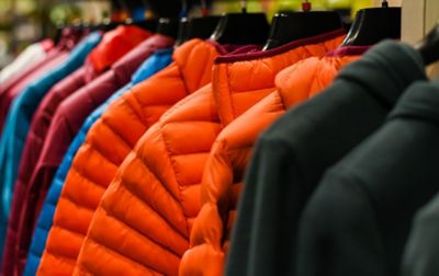 Rack of Columbia Sportswear jackets of varying colors and styles.  