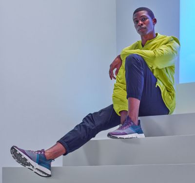 A men with a pair of Kinetic™ Rush Mesh Sneaker