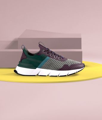 Kinetic Rush sneakers on a pink background