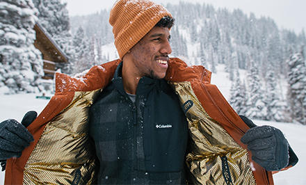Hiker wearing a jacket with Omni-Heat Infinity technology. 