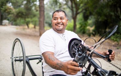 A man riding a bike.