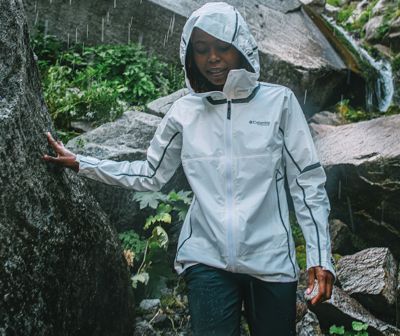 Woman in heavy rain.