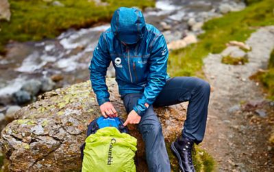 National Park Ranger in the rain equipped with Columbia waterproof gear