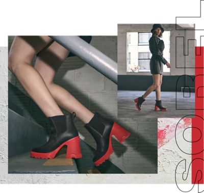 A woman wearing Brex Heel Chelsea boots in an urban setting