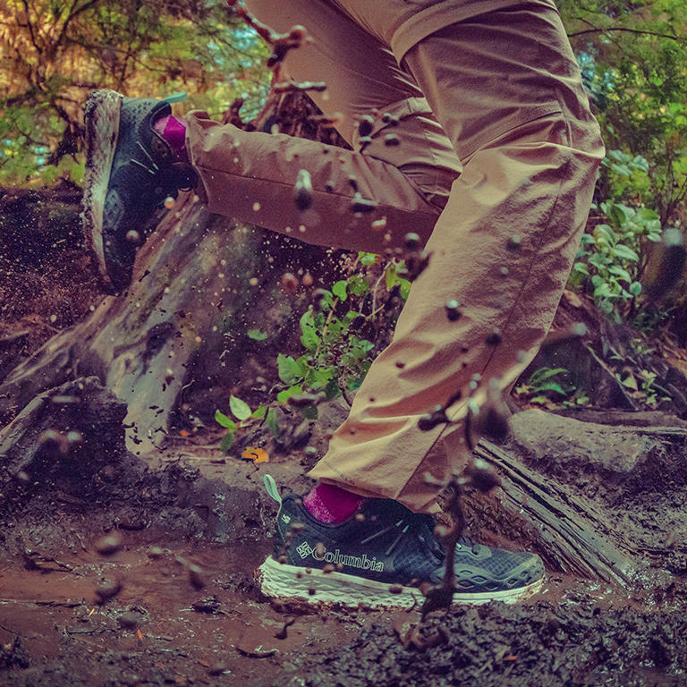 Adventure pants stomping through mud