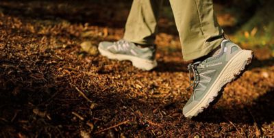 Close up of shoes in a wood.