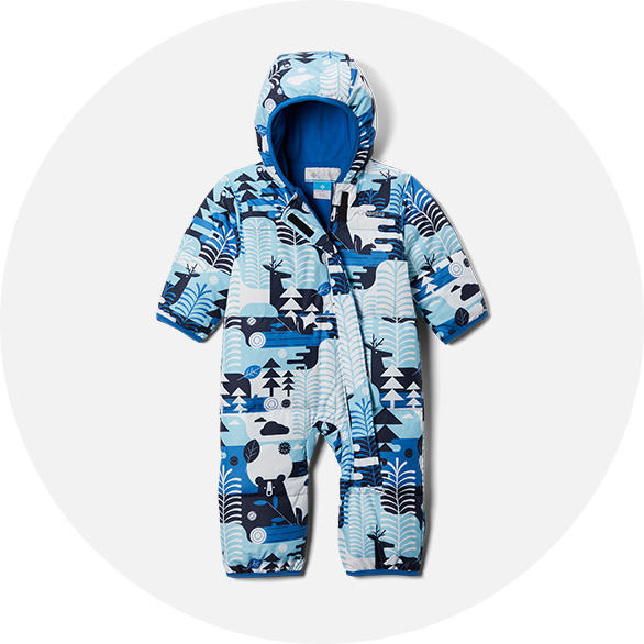 A cool looking baby snow suit with a blue and white forest print.