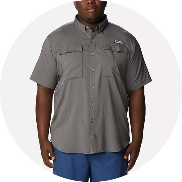 Man in a gray button-down fishing shirt.