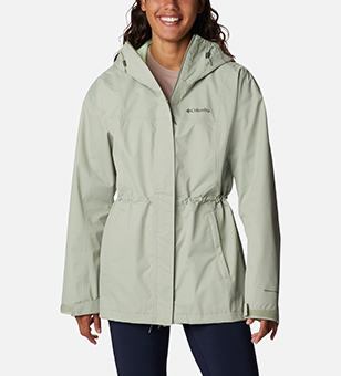 Woman in a light green rain jacket.