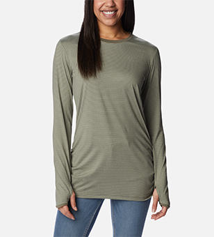 Woman in a long sleeve green top