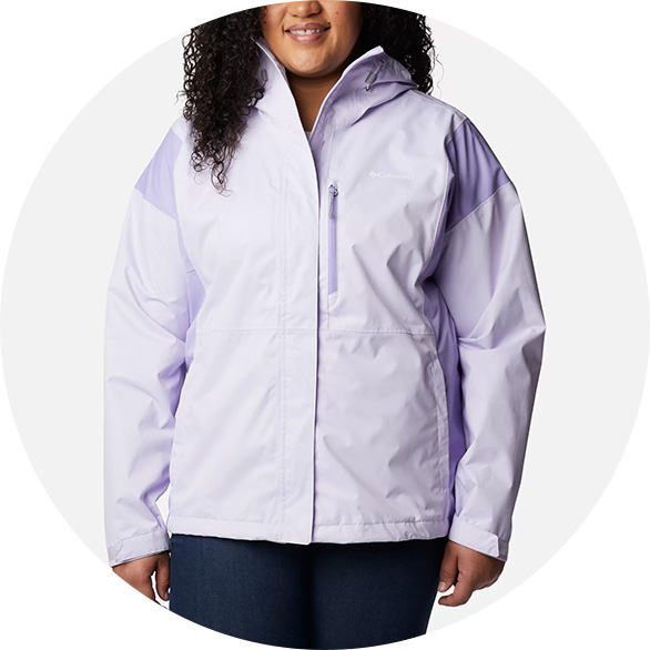 Woman in a light purple rain jacket.