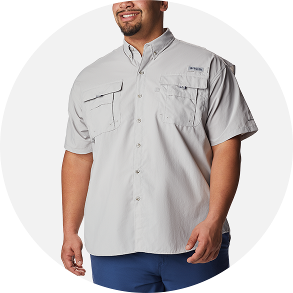 Man in a gray button-down fishing shirt.