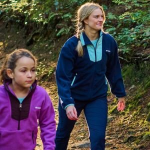 A mother and daughter hiking.
