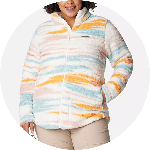 Woman in a plus size shirt jacket for fall.